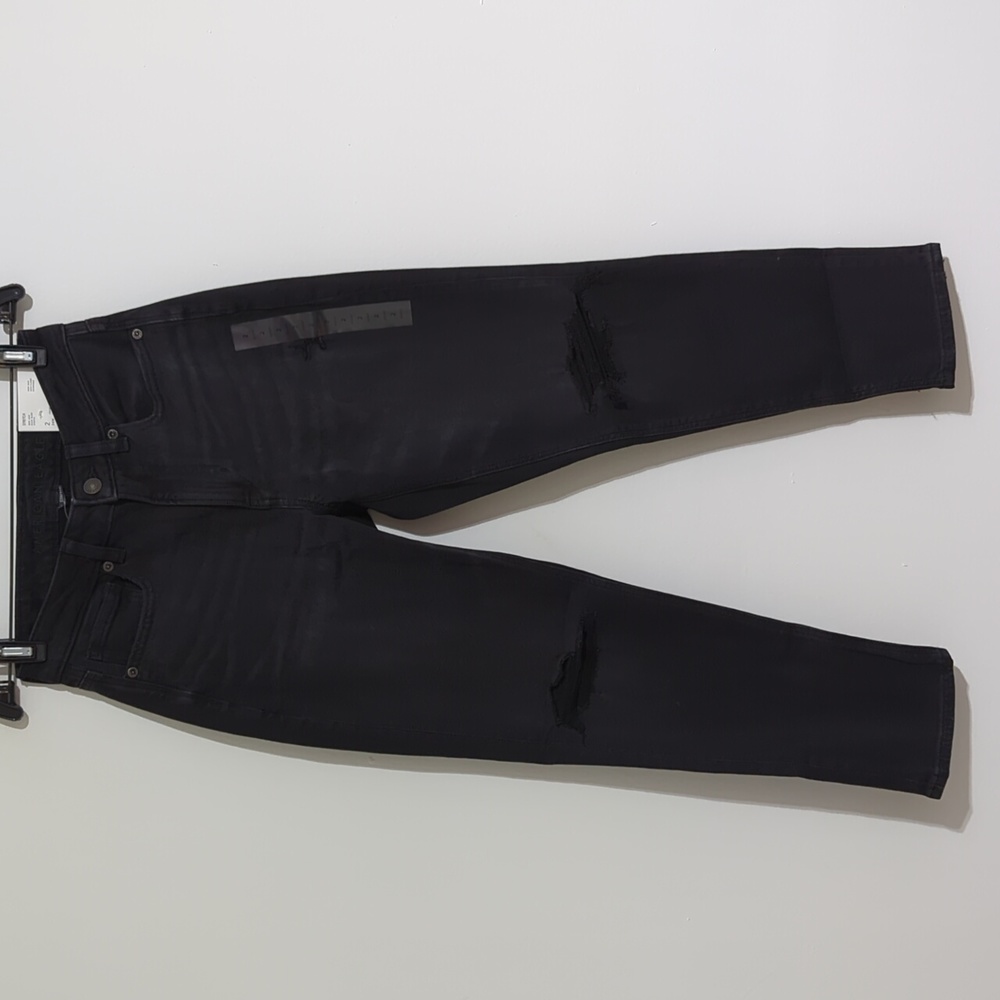 American Eagle stretch mom jean size 2 short black in color distressed knees